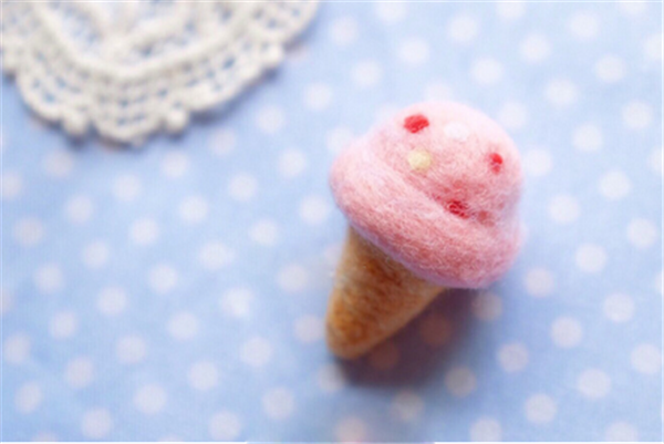 Romantic sweet little girl and her strawberry ice cream handmade wool felt making