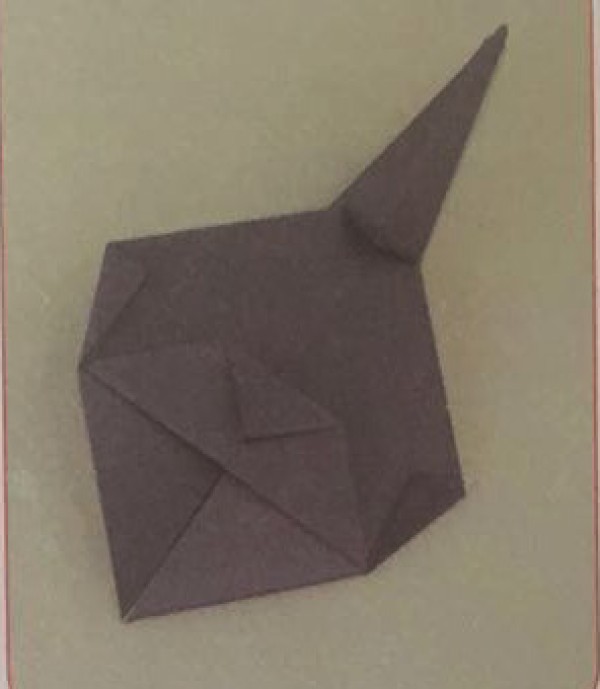 Illustration of steps for children to make handmade beetle origami