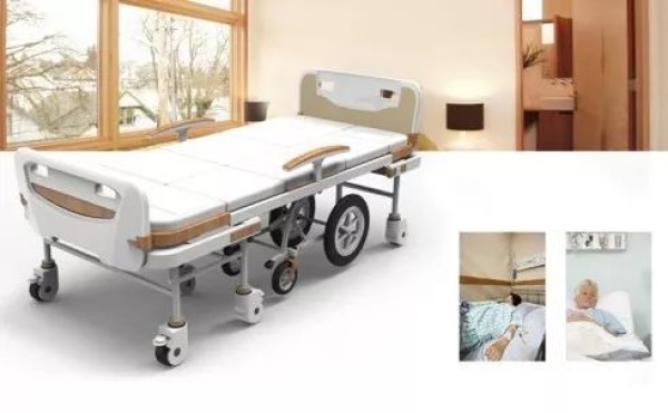 A hospital bed that can be separated into a wheelchair