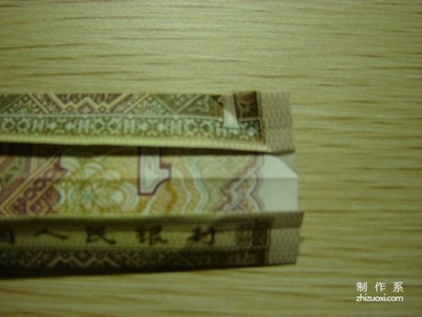 Illustrated tutorial for DIY handmade origami camera toys using RMB or US dollar banknotes