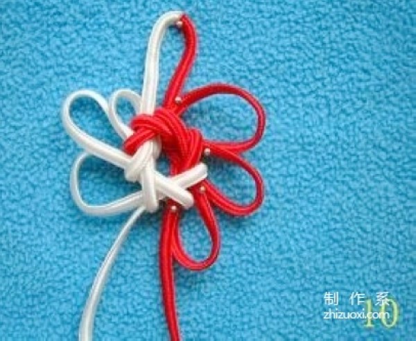 Tutorial on how to tie the Eight-Ear Hollow Tuanjin Knot