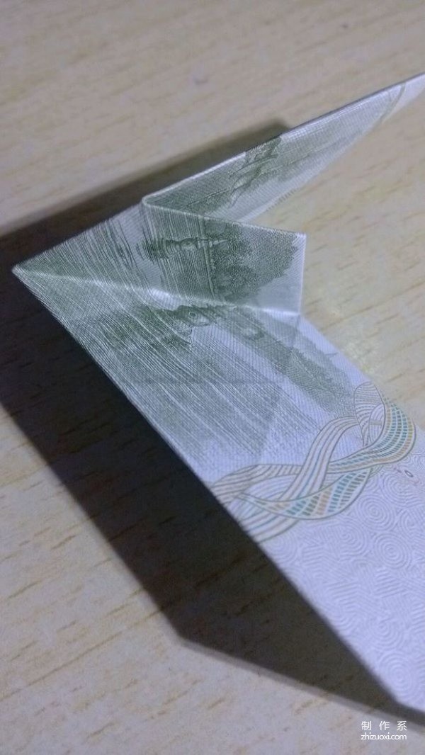 Illustrated tutorial on folding a hexagon using one-yuan banknotes