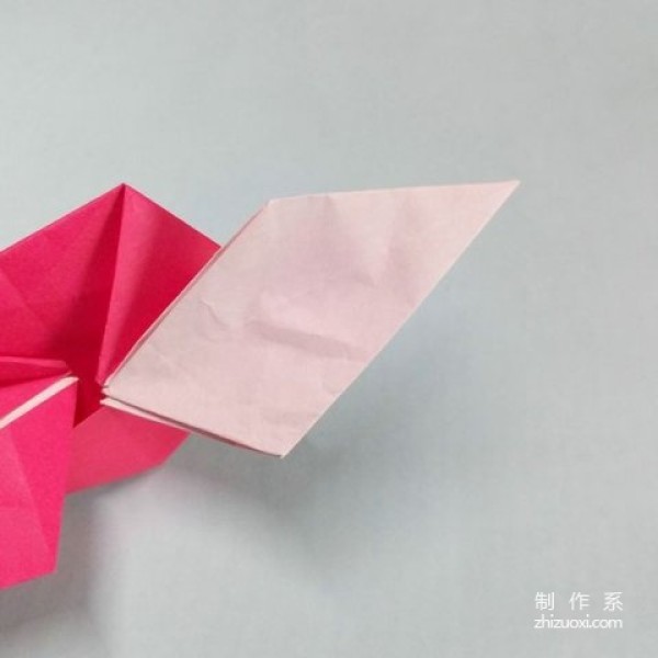 Tutorial on how to make handmade origami hearts with wings