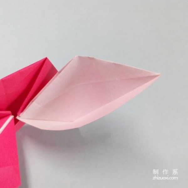 Tutorial on how to make handmade origami hearts with wings