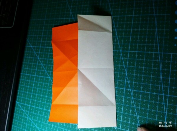 Origami method of folding a paper bird, real-life tutorial on origami of a small kingfisher