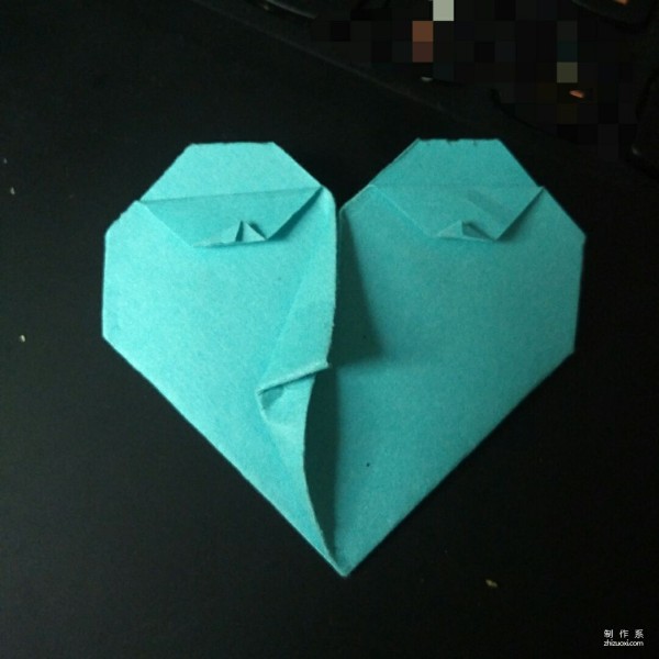 How to make a special heart-shaped origami with facial features