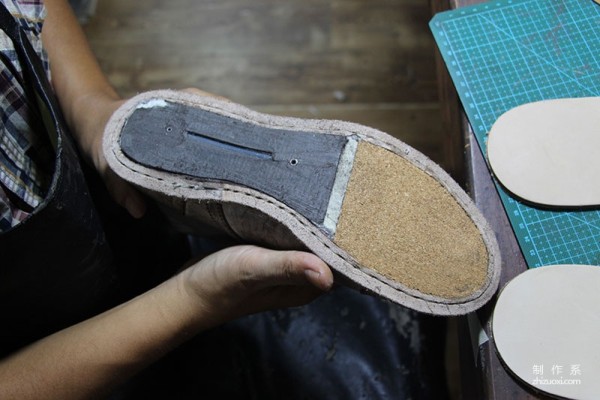 The making process of a pair of handmade work boots