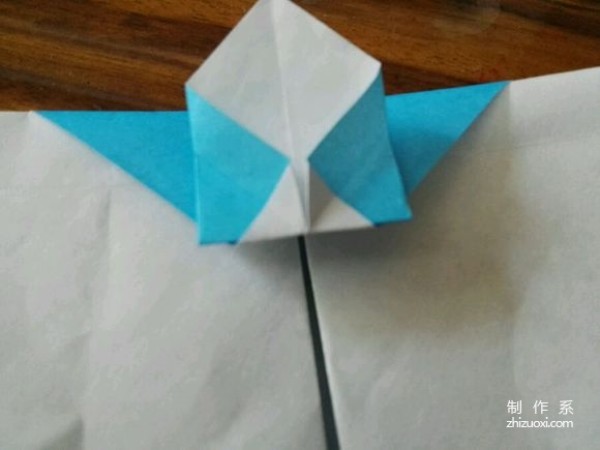 Little snowman origami tutorial with real-life pictures and illustrations