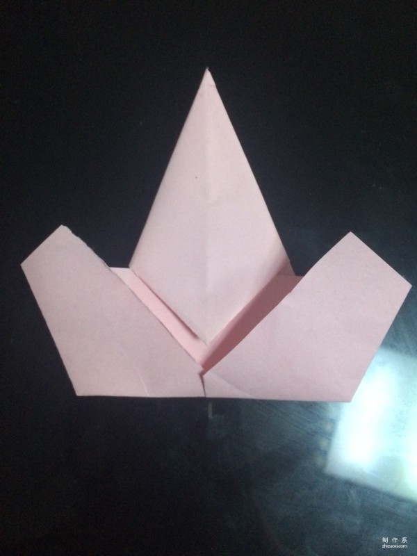 Very simple origami illustration of colored paper five-pointed star