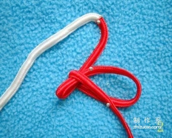 Tutorial on how to tie the Eight-Ear Hollow Tuanjin Knot