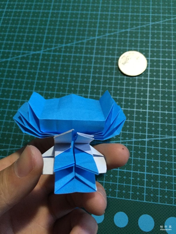 Real-life tutorial on origami Chirulian with complex origami cartoon characters