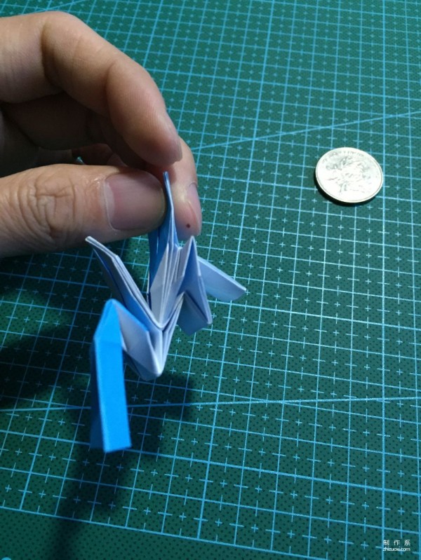 Real-life tutorial on origami Chirulian with complex origami cartoon characters