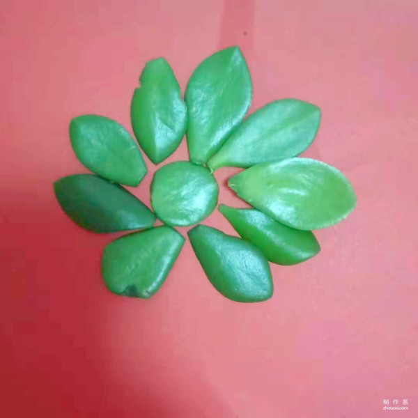 Childrens handmade leaf sticker method for small potted plants