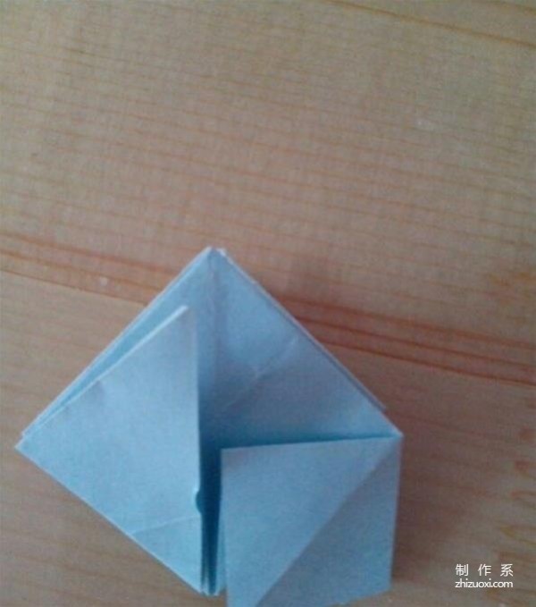 Illustrated tutorial on how to make origami Lei Feng Tower as a child