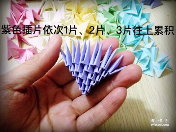 Insert a rainbow heart into a triangle, a tutorial on how to make a beautiful love using origami using a triangle