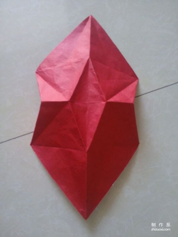 Illustrated origami tutorial for folding a three-dimensional little fox