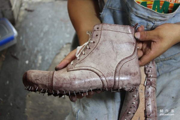 The making process of a pair of handmade work boots