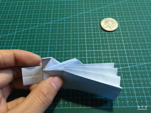 Real-life tutorial on origami Chirulian with complex origami cartoon characters