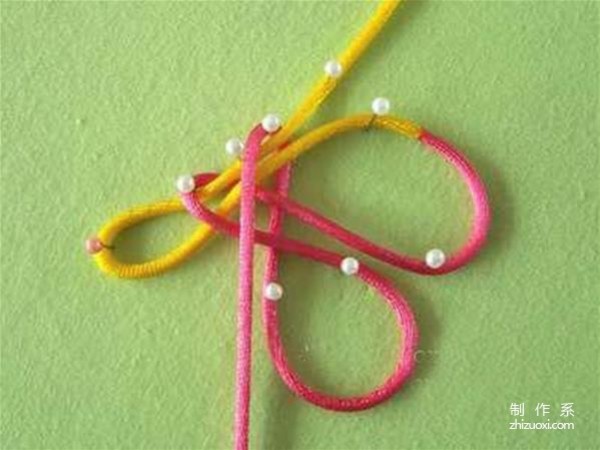 Illustrated tutorial on how to tie the six-ear tuanjin knot