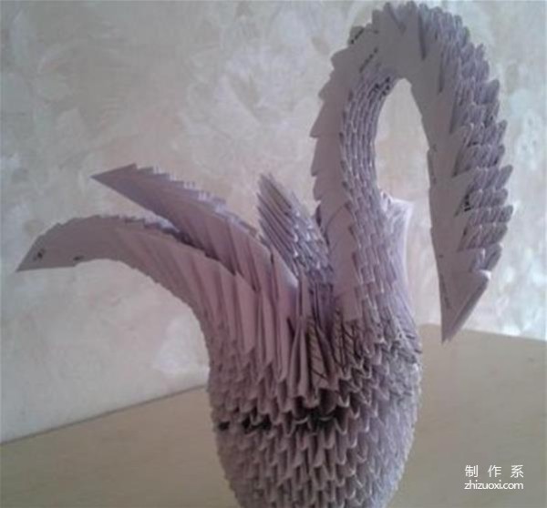 Illustrated tutorial on DIY production method of white swan in triangle