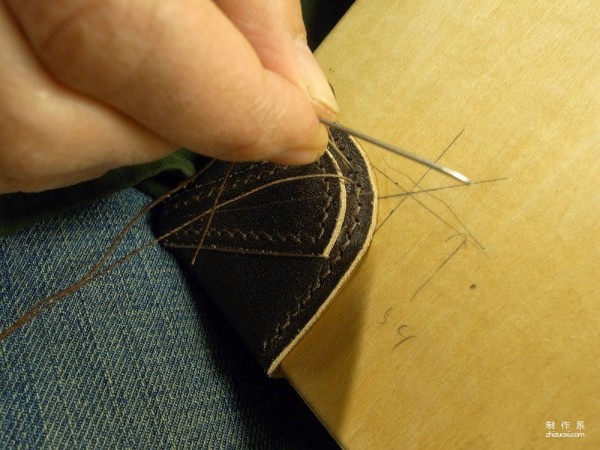 The process of Japanese craftsman Yukihiro Fujii making a leather suitcase based on a wooden box frame