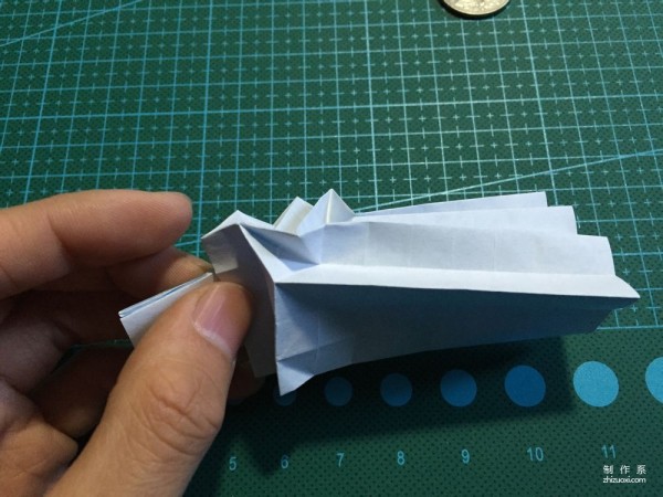 Real-life tutorial on origami Chirulian with complex origami cartoon characters