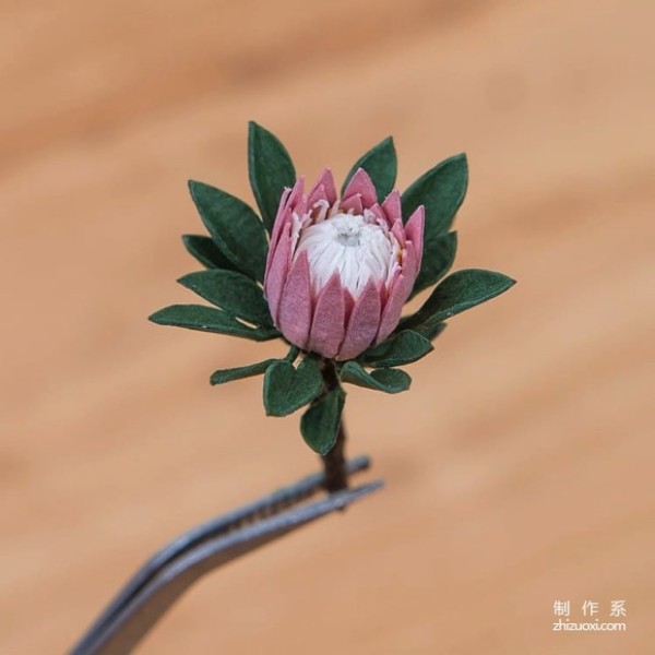 A very delicate paper potted plant, a relatively realistic-looking origami art tutorial