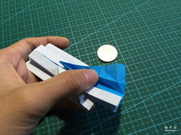 Real-life tutorial on origami Chirulian with complex origami cartoon characters