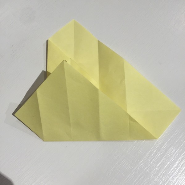 Detailed step-by-step illustration of creative origami for chicken red envelope