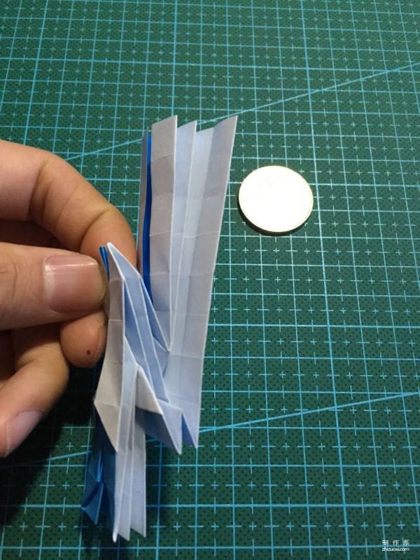 Real-life tutorial on origami Chirulian with complex origami cartoon characters