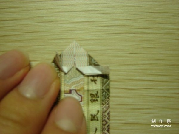 Illustrated tutorial for DIY handmade origami camera toys using RMB or US dollar banknotes