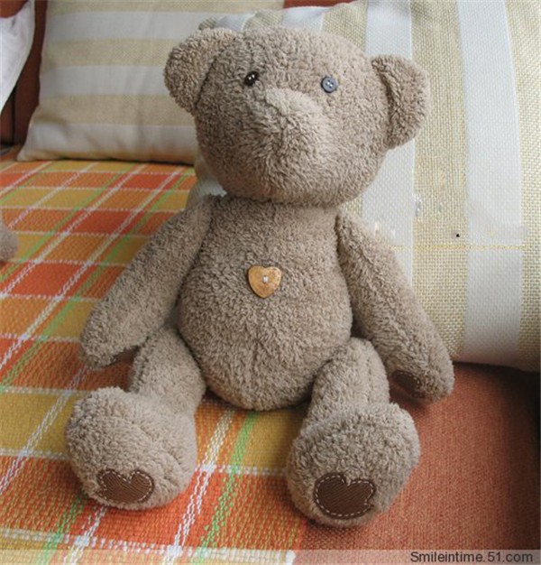 Cute brown plush teddy bear made from handmade DIY fabric