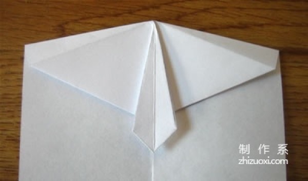 Detailed tutorial on how to make a small shirt using dollar origami