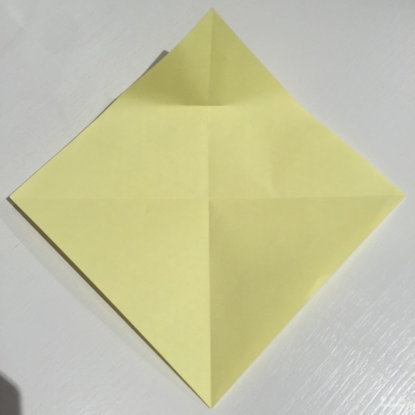 Detailed step-by-step illustration of creative origami for chicken red envelope