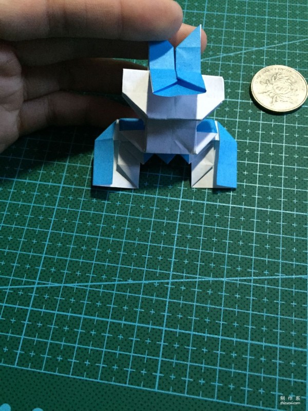 Real-life tutorial on origami Chirulian with complex origami cartoon characters