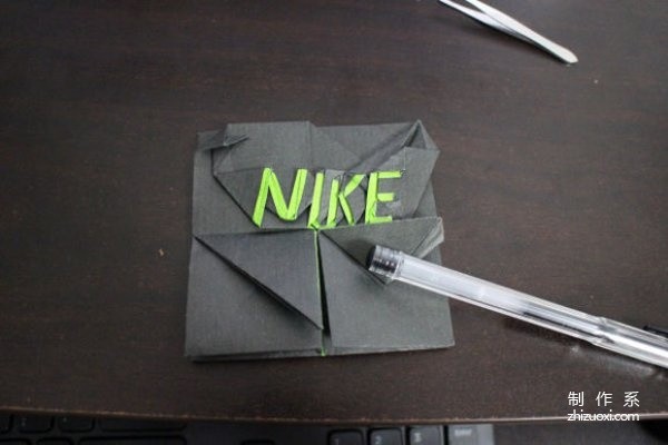 A very creative graphic tutorial on origami Nike logo