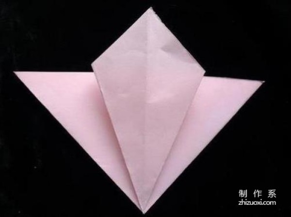 How to fold a lily ball. Illustrated origami tutorial of a four-petal lily ball.