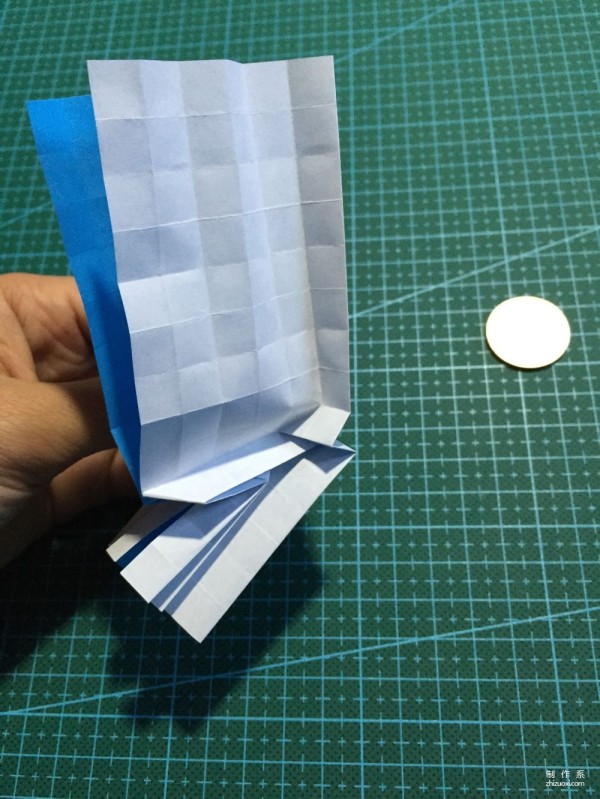 Real-life tutorial on origami Chirulian with complex origami cartoon characters