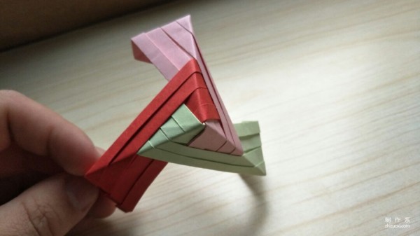 Illustration of how to make simple origami hollow squares for children