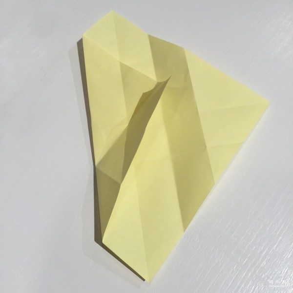 Detailed step-by-step illustration of creative origami for chicken red envelope