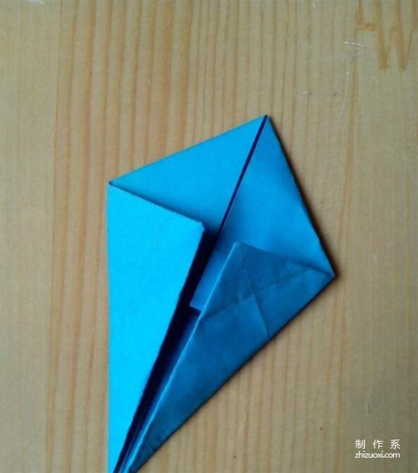 A tutorial on how to make a swallow-shaped paper airplane origami toy