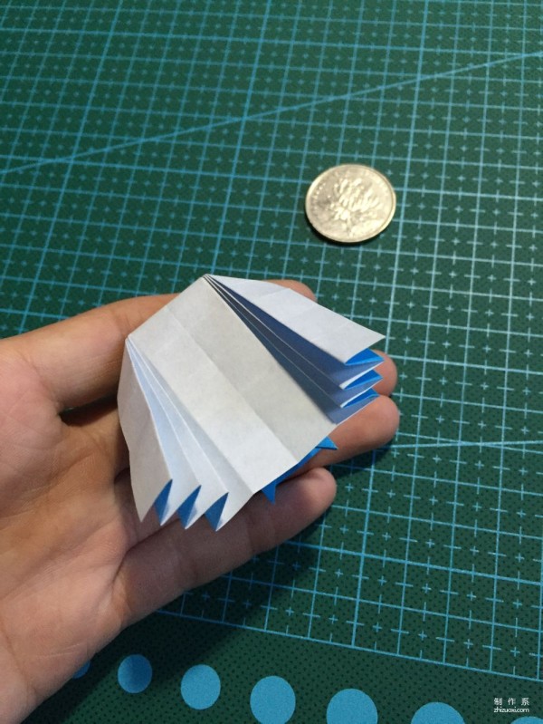 Real-life tutorial on origami Chirulian with complex origami cartoon characters