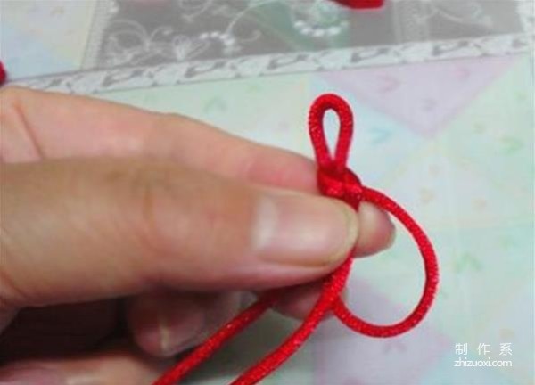 Illustrated tutorial on how to tie the pipa knot