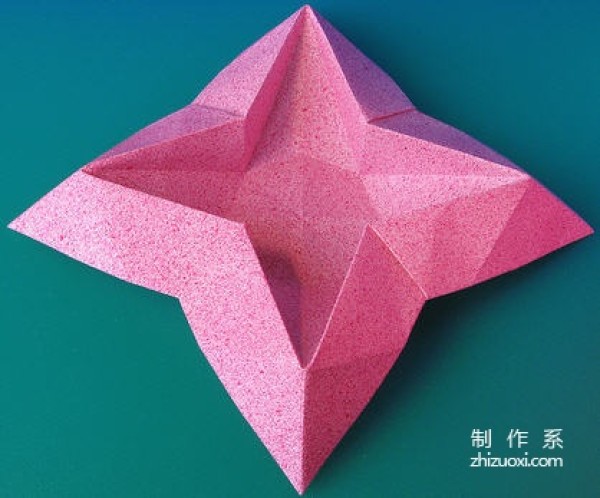 Origami method of folding a star-shaped garbage box