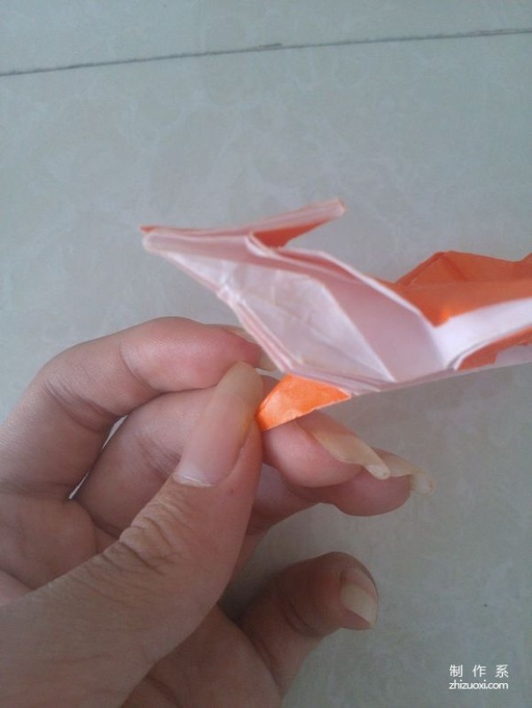 Real-life illustrated tutorial on how to make fox origami