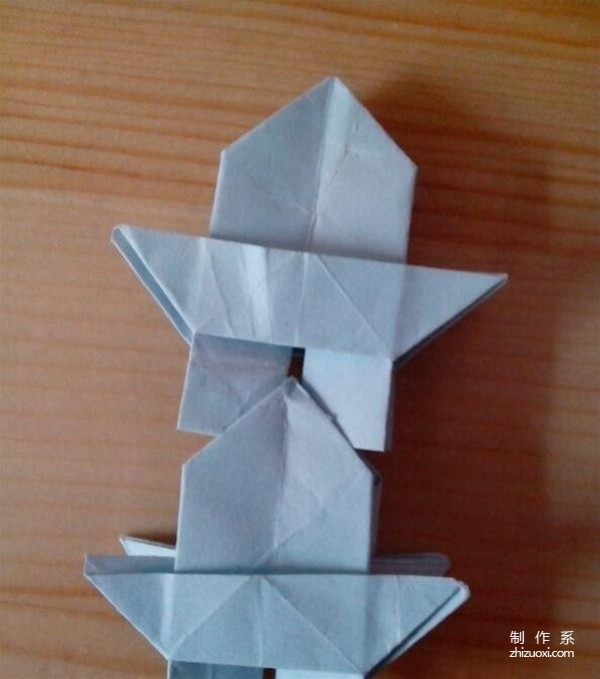 Illustrated tutorial on how to make origami Lei Feng Tower as a child