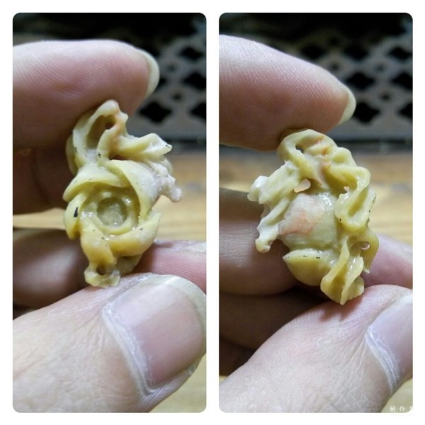 Hand carving method of stone wintersweet fan pendant