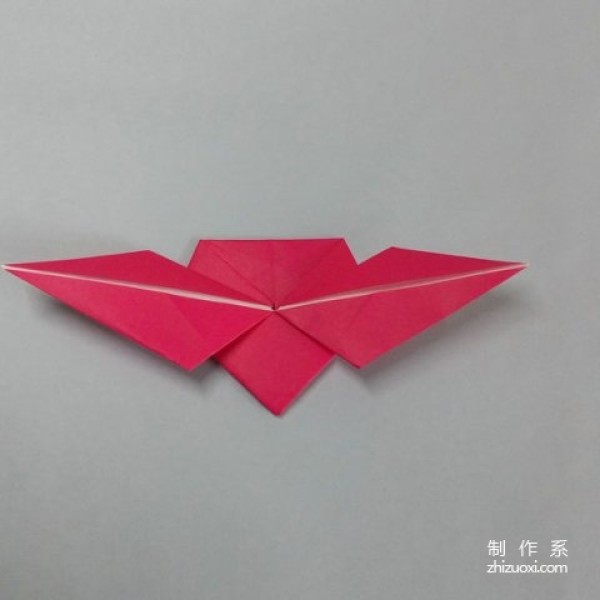 Tutorial on how to make handmade origami hearts with wings