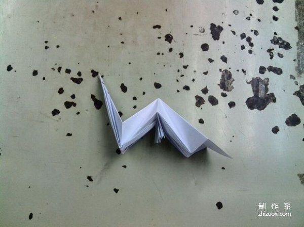 Origami tutorial for children using origami method to fold dinosaurs