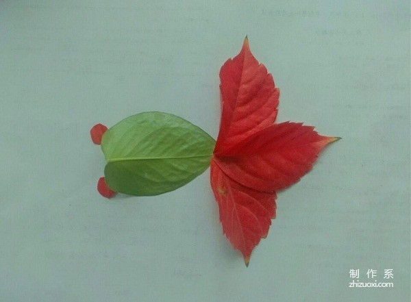 A handmade tutorial for leaf stickers with red tailed fish